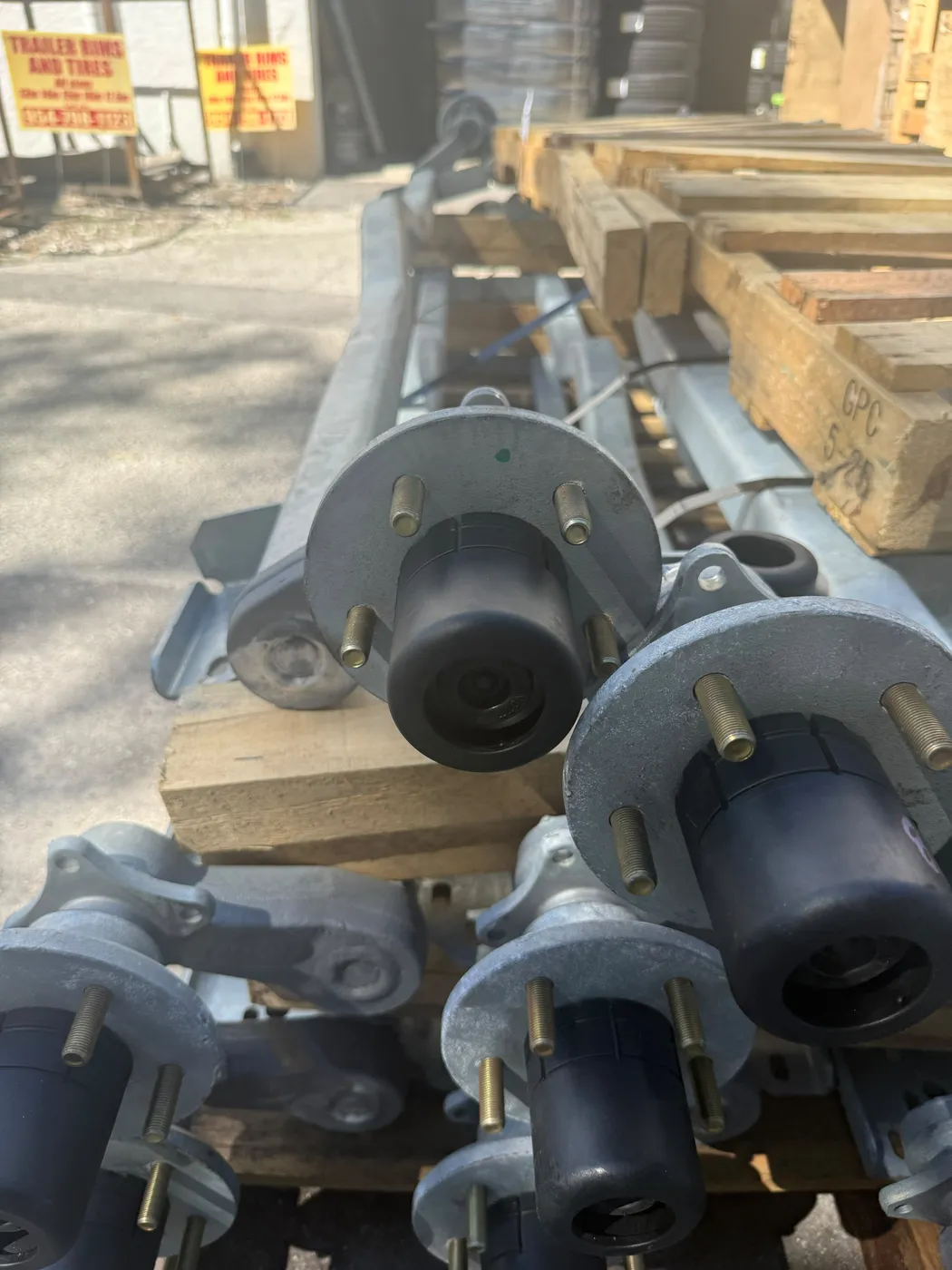 Galvanized trailer axles with hubs ready to ship